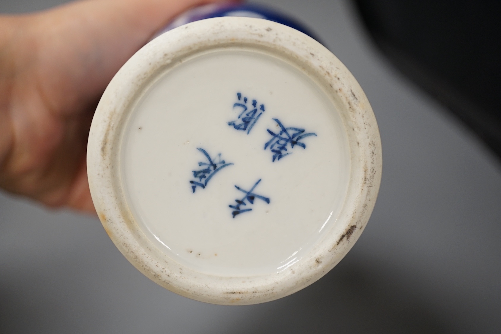 A 19th century Chinese blue and white prunus jar, a crackle glaze vase and a famille rose jar and cover